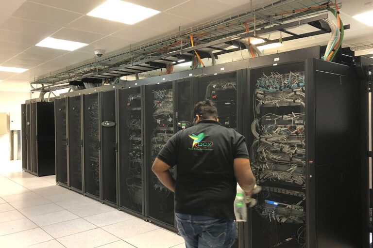 DCX Technologies Power Team performing data center Maintenace and data center power & cooling service